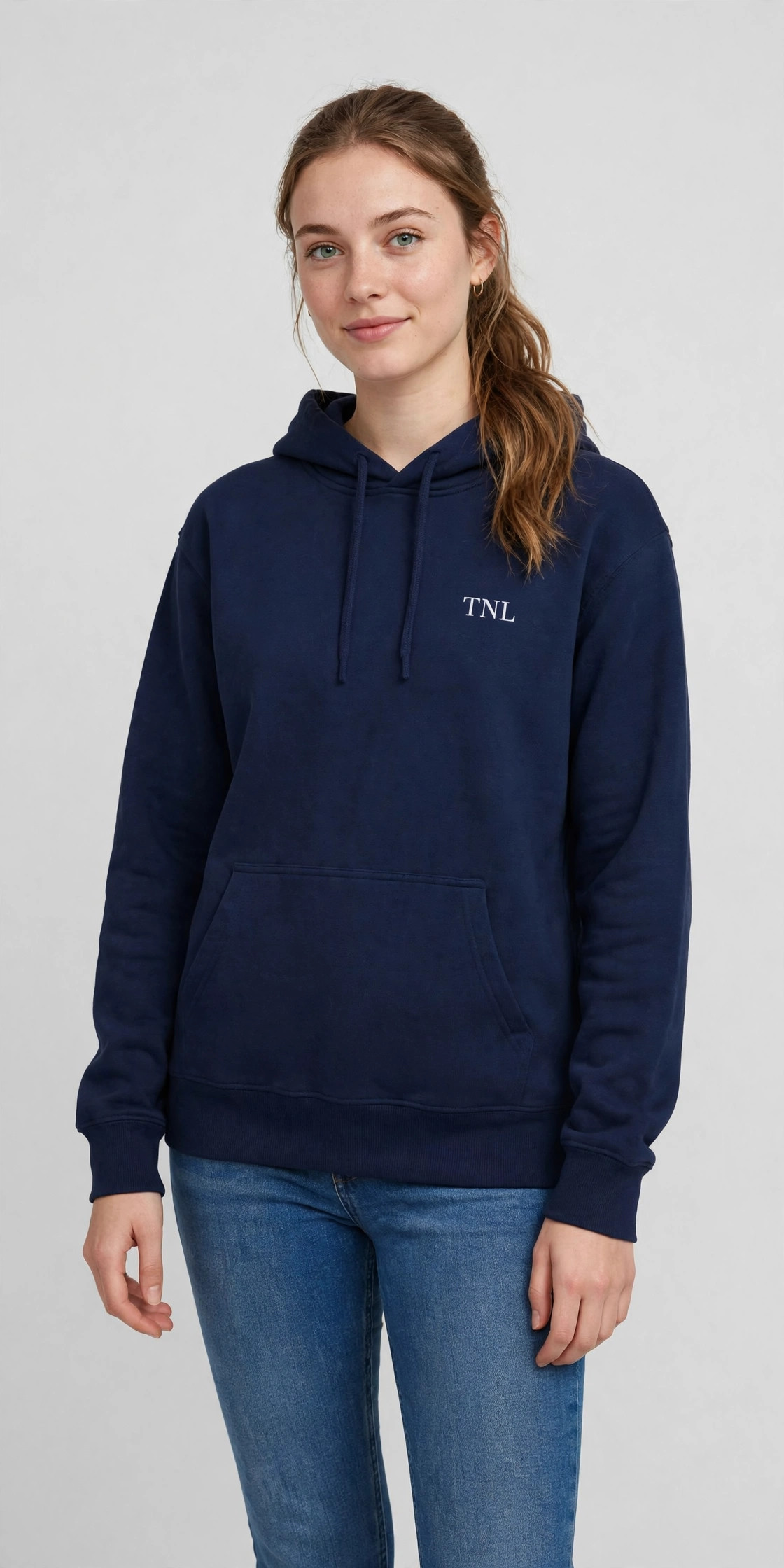 Woman wearing the TNL Classic Hoodie in navy
